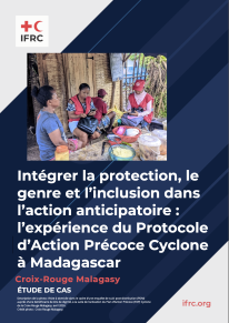 Malagasy Red Cross volunteers interview a woman beneficiary during a home visit as part of post-distribution monitoring following cyclone anticipatory actions. The image illustrates an IFRC case study on integrating Protection, Gender and Inclusion (PGI) into anticipatory action in Madagascar.