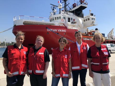IFRC staff in front of the SOS Med.