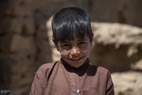 Boy facing the camera and smiling. Afghanistan.
