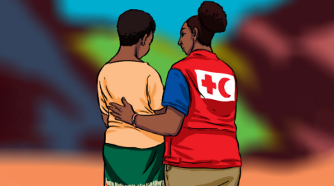 A RCRC frontline staff providing support